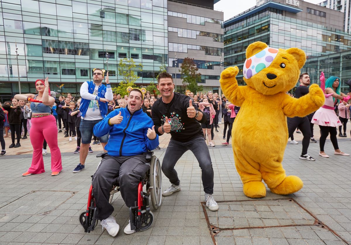 Pudsey and Strictly's Aljaz Skorjanec pose with dancers for the live launch
